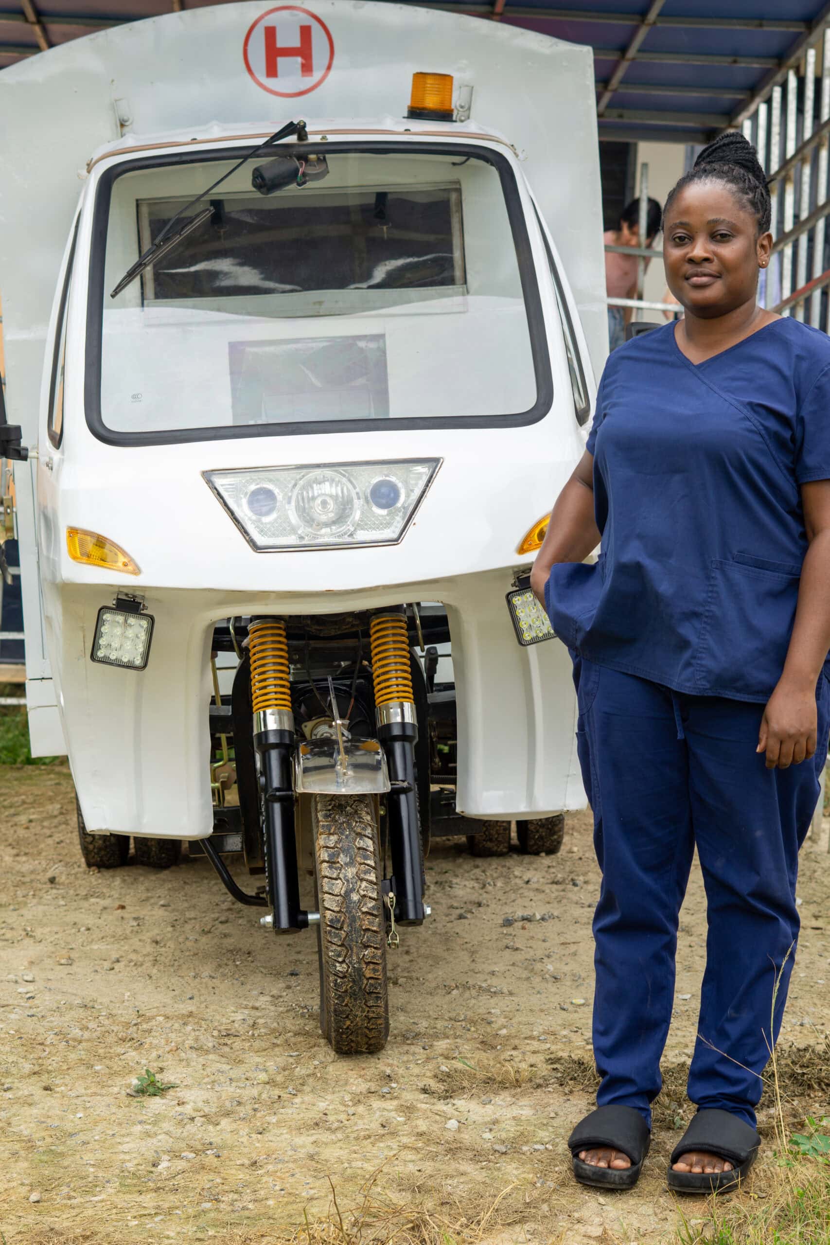 A motorcycle parked outside a health facility in rural Ghana used by community health workers to reach remote villages.